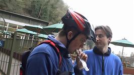 Gavin and Tao waiting outside Gough's Cave, Cheddar